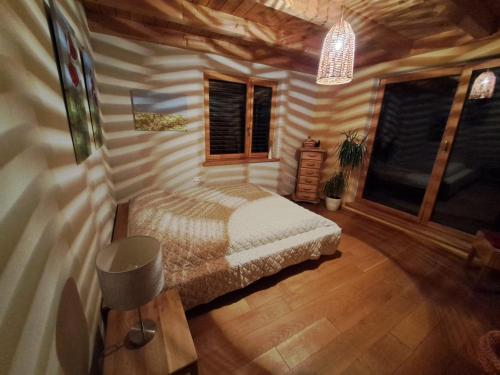 Katil atau katil-katil dalam bilik di FeWo "Alpakaleben" im ökologischen Holzhaus mit traumhafter Aussicht und Alpakas