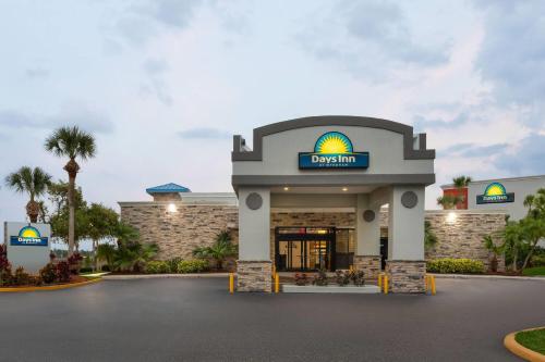 a rendering of the front of a hotel at Days Inn by Wyndham Orlando Conv. Center/International Dr in Orlando