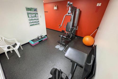 an overhead view of a room with a gym at Ramada by Wyndham Sherwood Park in Sherwood Park