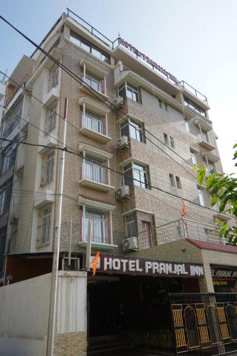 a large building with a hotel principal written on it at Hotel Pranjal Inn in Patna