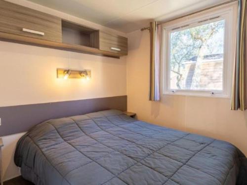 Imagen de la galería de Mobil home pour 7 pers avec terrasse à Soustons - API-1-52-418, en Soustons