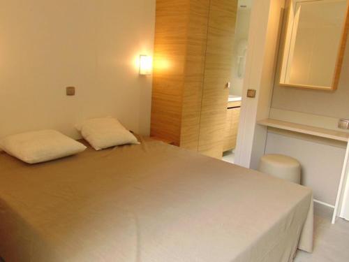 Postel nebo postele na pokoji v ubytování Mobil home 33m², 2 chambres, 6 personnes, Terrasse - API-1-52-474