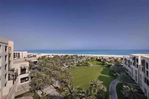 an aerial view of the resort with the ocean in the background at Park Hyatt Abu Dhabi Hotel and Villas in Abu Dhabi
