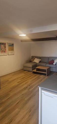 a living room with a couch and a table at Turístic Tarragona in Tarragona