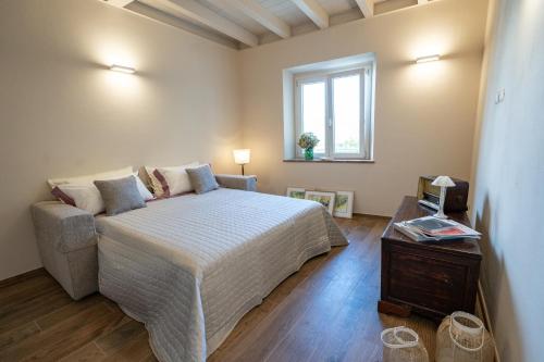 Katil atau katil-katil dalam bilik di Residenze Volpigliano