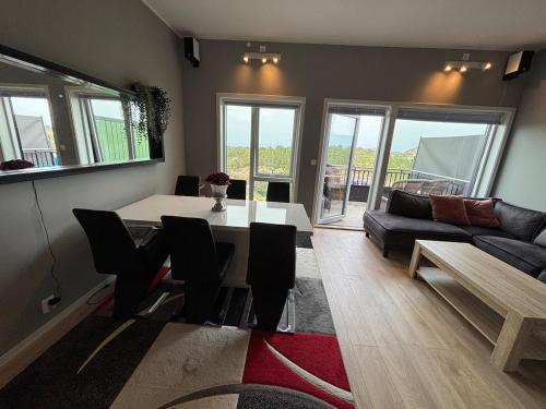 Χώρος καθιστικού στο Nice apartment in Osundet