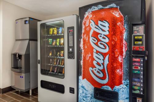 a cocacola soda vending machine with a coke bottle at Quality Inn West of Asheville in Canton