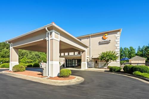 a rendering of a hotel building with a parking lot at Comfort Inn & Suites Oxford South in Oxford