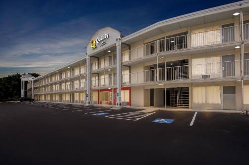 an empty parking lot in front of a hotel at Quality Inn Lexington in Lexington