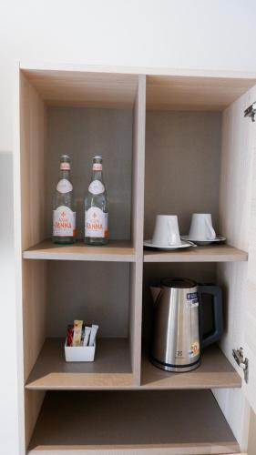 Dapur atau dapur kecil di The Lush Apartments & Suites
