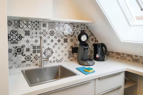 مطبخ أو مطبخ صغير في Ferienwohnung Maisonette am See