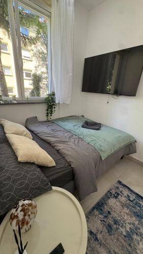 Postel nebo postele na pokoji v ubytování Klein und feines City Apartment
