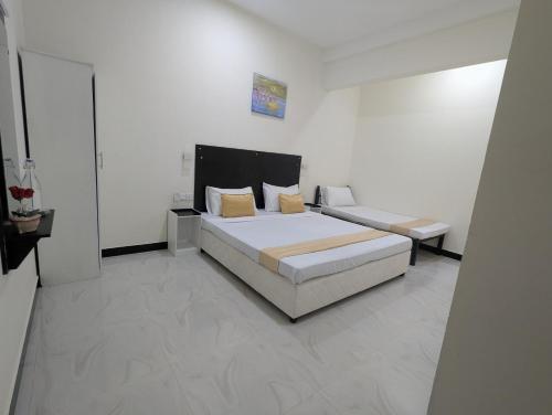 Ένα ή περισσότερα κρεβάτια σε δωμάτιο στο Sienna Retreat, Kandy