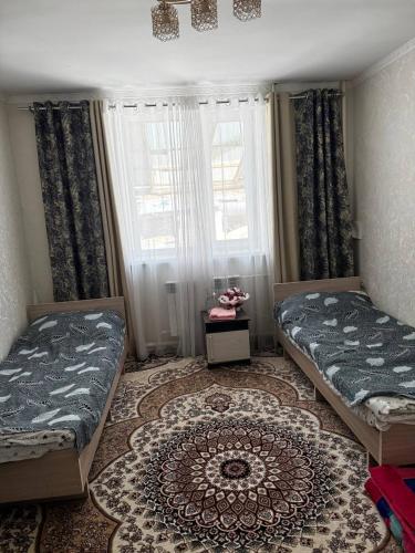 Katil atau katil-katil dalam bilik di East guest house