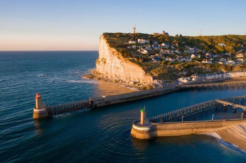 an aerial view of a pier and the ocean at Au Clerc de l'Orangerie 2-6 voyageurs in Fécamp