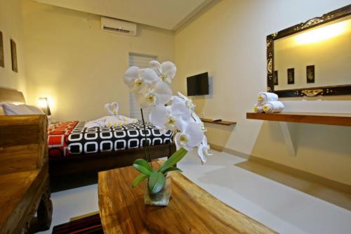 Cama o camas de una habitación en Rai House Sanur