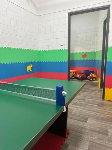 a ping pong room with a ping pong table at Hotel Pod Radnicí in Šumperk