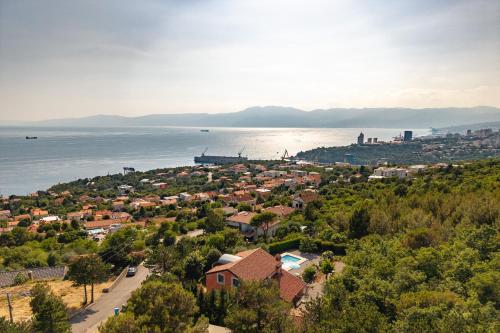 a view of a town and the water at Tiny House With Private Pool Kostrena - Happy Rentals in Kostrena