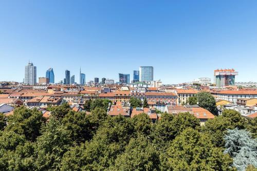 a view of a city with buildings and trees at Milan Retreats in Milan
