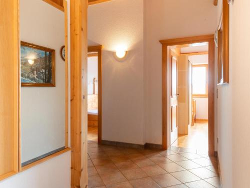a hallway with a door leading into a room at Welcoming apartment in Stummerberg with terrace in Stummerberg