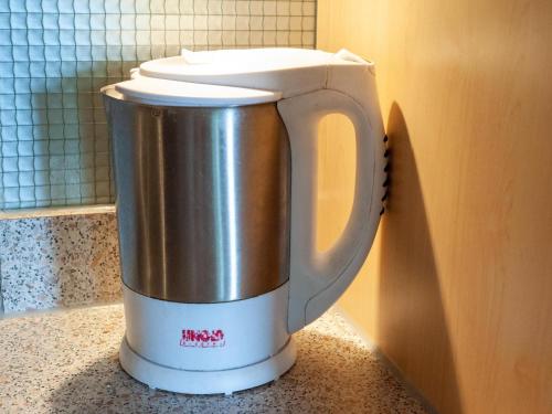 a coffee pot sitting on top of a counter at Welcoming apartment in Stummerberg with terrace in Stummerberg