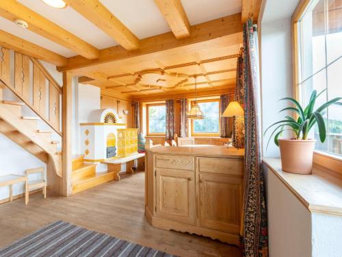 a bathroom with a sink and a staircase in a house at Welcoming apartment in Stummerberg with terrace in Stummerberg