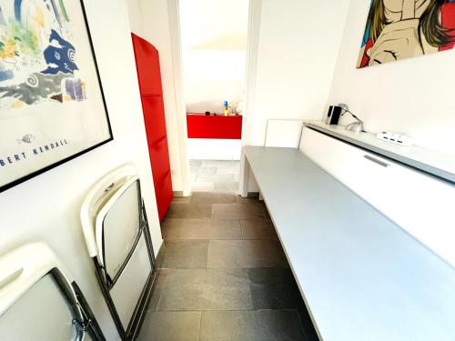 a bathroom with a counter and a sink at Suite Vallarino 17 - Sanremo in Sanremo