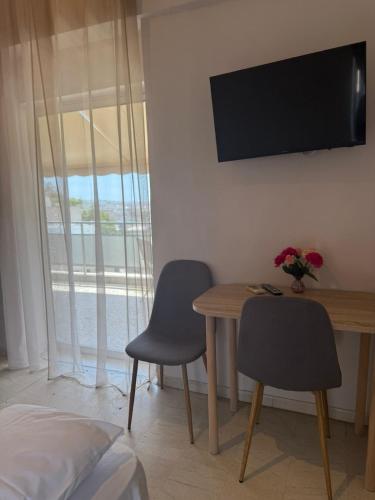 Μια τηλεόραση ή/και κέντρο ψυχαγωγίας στο Beautiful apartment in Petralona