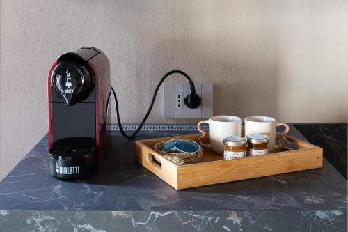 Tetera y cafetera en La Volta