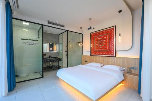 Katil atau katil-katil dalam bilik di Hidden Hill Xiaoyin B&B