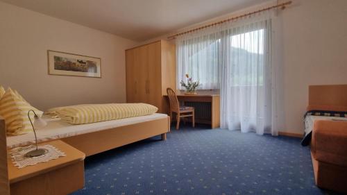 Ένα ή περισσότερα κρεβάτια σε δωμάτιο στο Eschenleit Ferienappartements