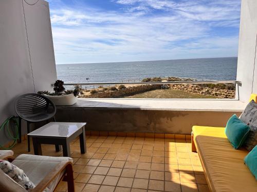 a balcony with a view of the ocean at Calatabarca B&B in Tabarca