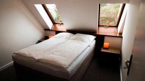 Postel nebo postele na pokoji v ubytování A7 Apartments