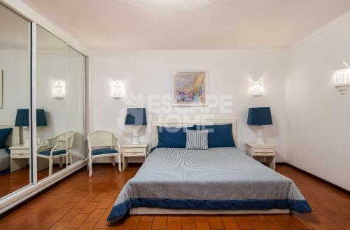 En eller flere senge i et værelse på Casa do Levante