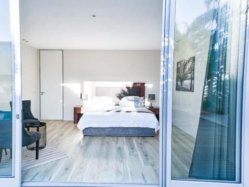 GND Properties Luxury Holiday Homeにあるベッド