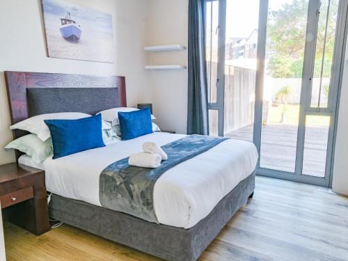 GND Properties Luxury Holiday Homeにあるベッド
