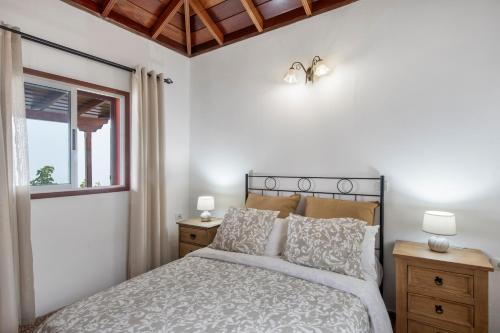 Postel nebo postele na pokoji v ubytování Casa Balcon Garafia