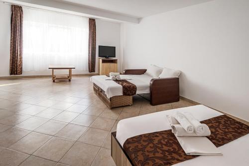 Postel nebo postele na pokoji v ubytování Marcos