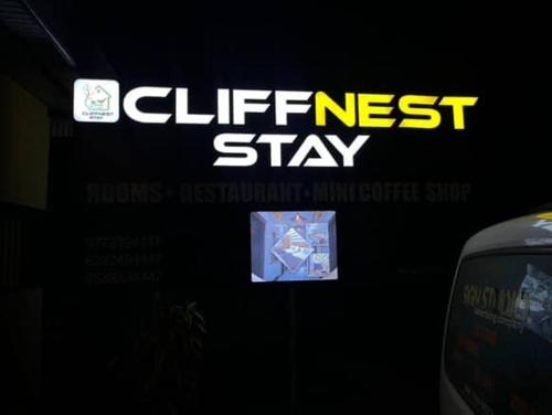 a sign that says the next stay on a building at CliffNest Stay in Ramakkalmedu