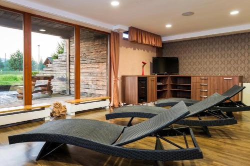 Μια τηλεόραση ή/και κέντρο ψυχαγωγίας στο Apartmán Martius Veľká Lomnica