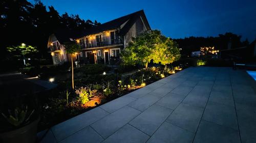 Jardín al aire libre en Dom Wypoczynkowy Simurg