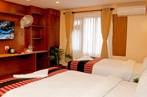 HotelInsta tesisinde bir odada yatak veya yataklar
