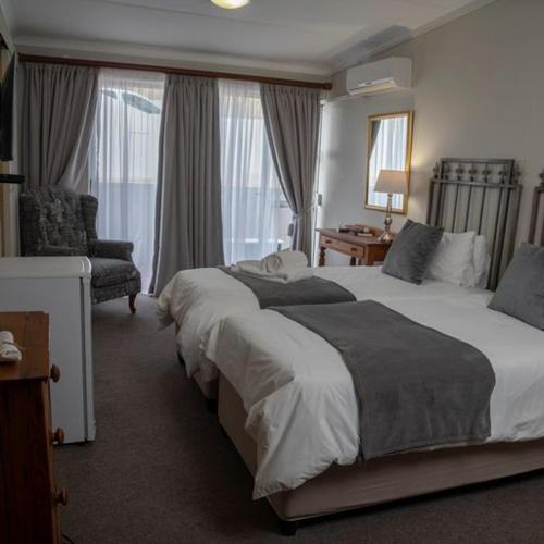 Ein Bett oder Betten in einem Zimmer der Unterkunft Mountain View Guesthouse