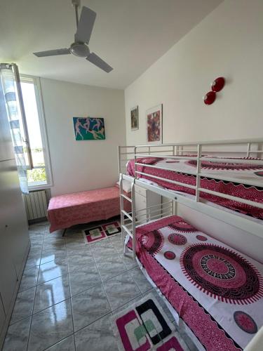 Postel nebo postele na pokoji v ubytování Appartamento vacanze Golban