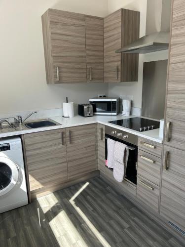 Stylish apartment in Halifaxにあるキッチンまたは簡易キッチン