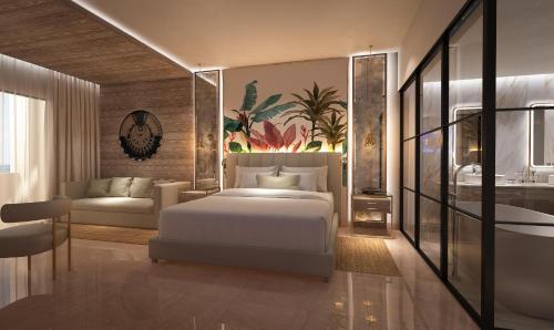 a bedroom with a white bed and a bathroom at Grand Sunset Princess - All Inclusive in Playa del Carmen