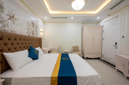 Riverside Hotel Đông Anhにあるベッド