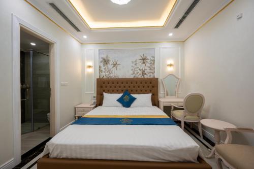 Riverside Hotel Đông Anhにあるベッド