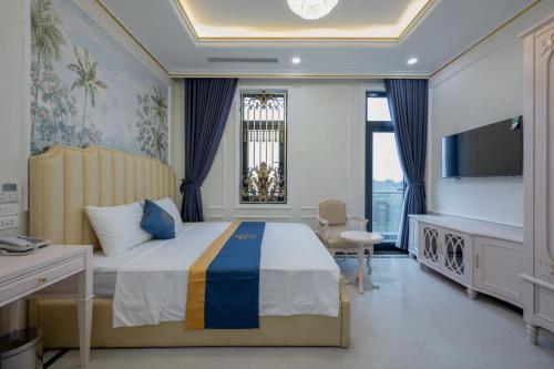 Riverside Hotel Đông Anhにあるベッド