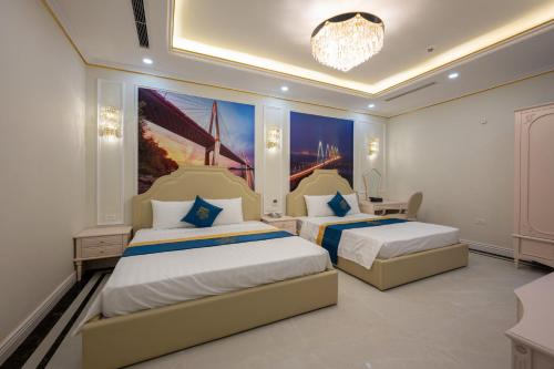 Riverside Hotel Đông Anhにあるベッド